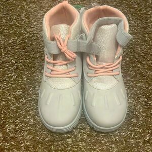 NWT Carter’s Girls’ rubber boots. Never worn. Size 2Y.